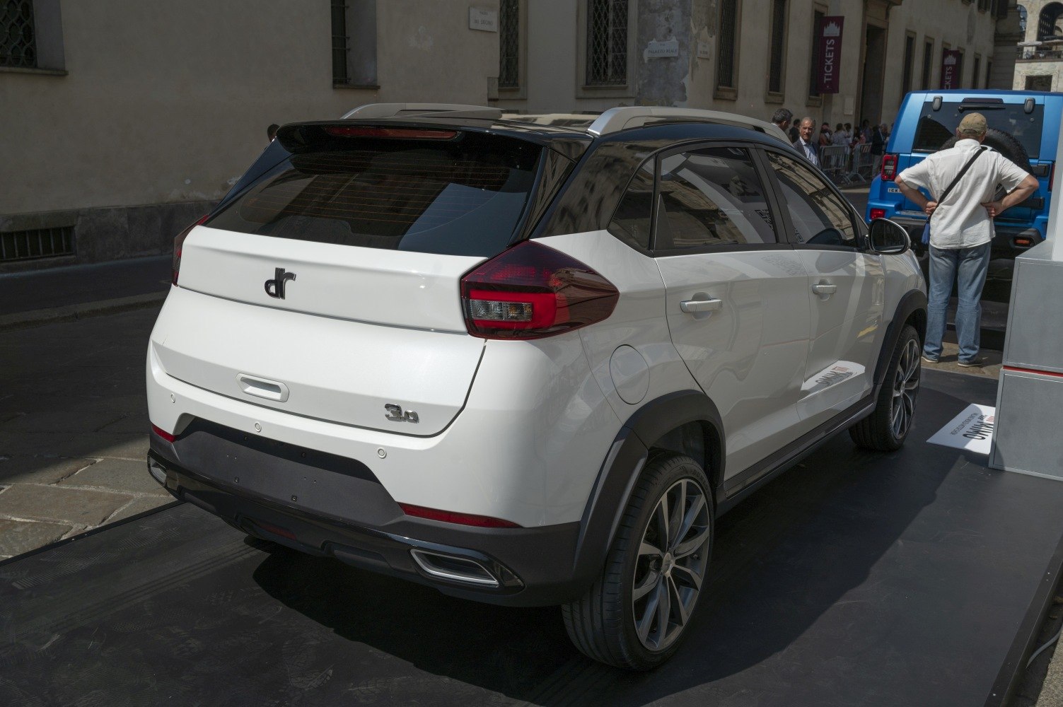 Rear view of SUV with black roof and modern tail lights