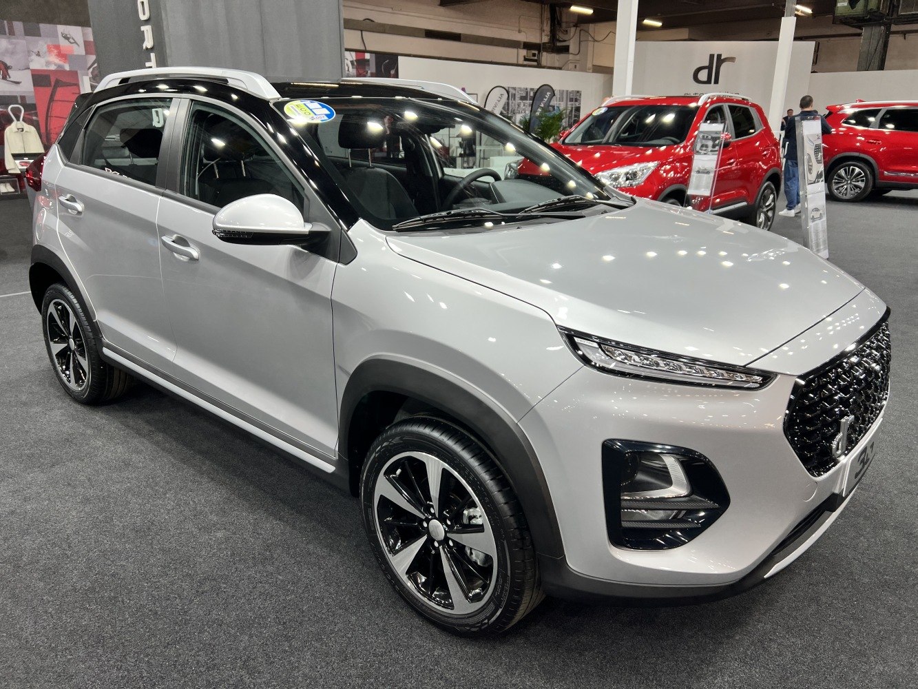 Compact SUV front side profile with LED headlights and alloy wheels