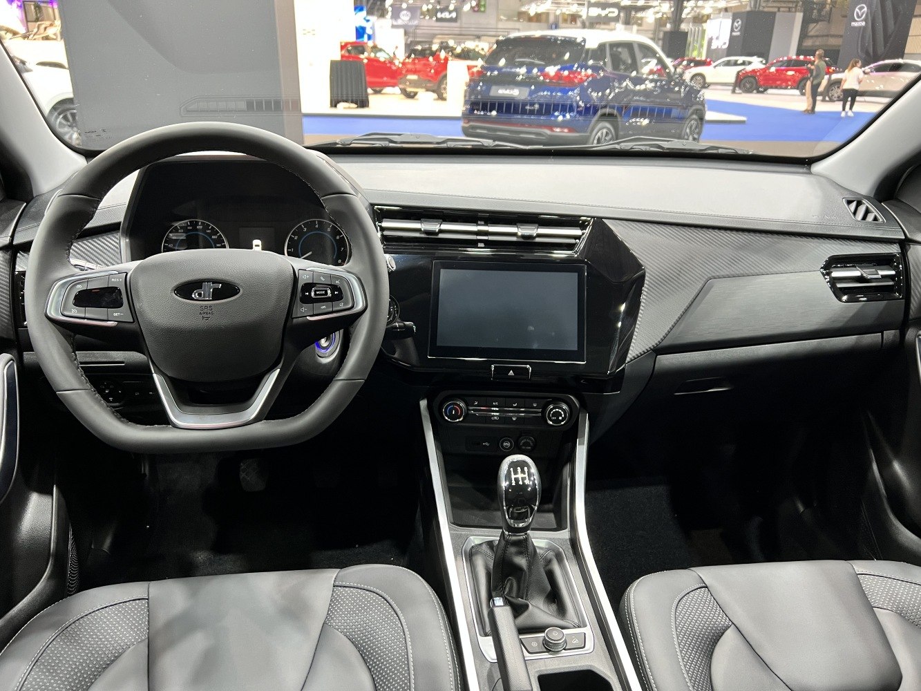 Interior with touchscreen infotainment and manual gearshift