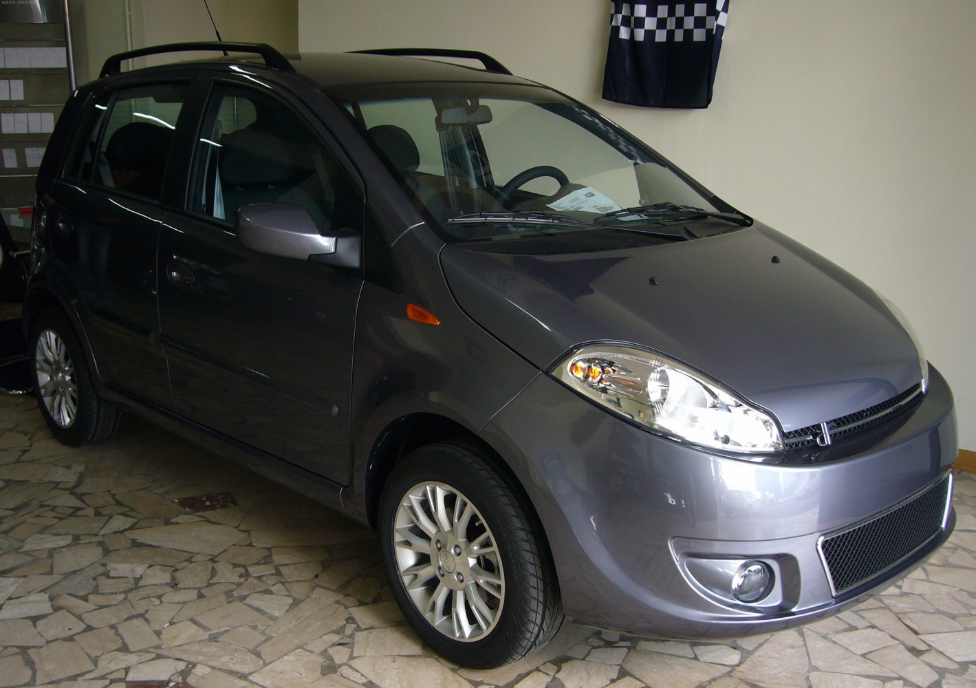 Compact hatchback with alloy wheels and roof rails