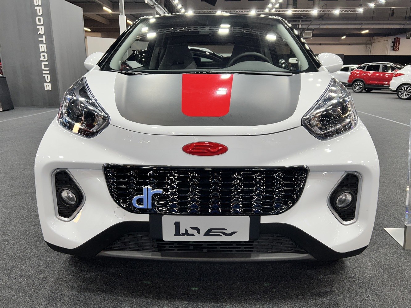 Front view with hood accent, LED headlights, and intricate grille