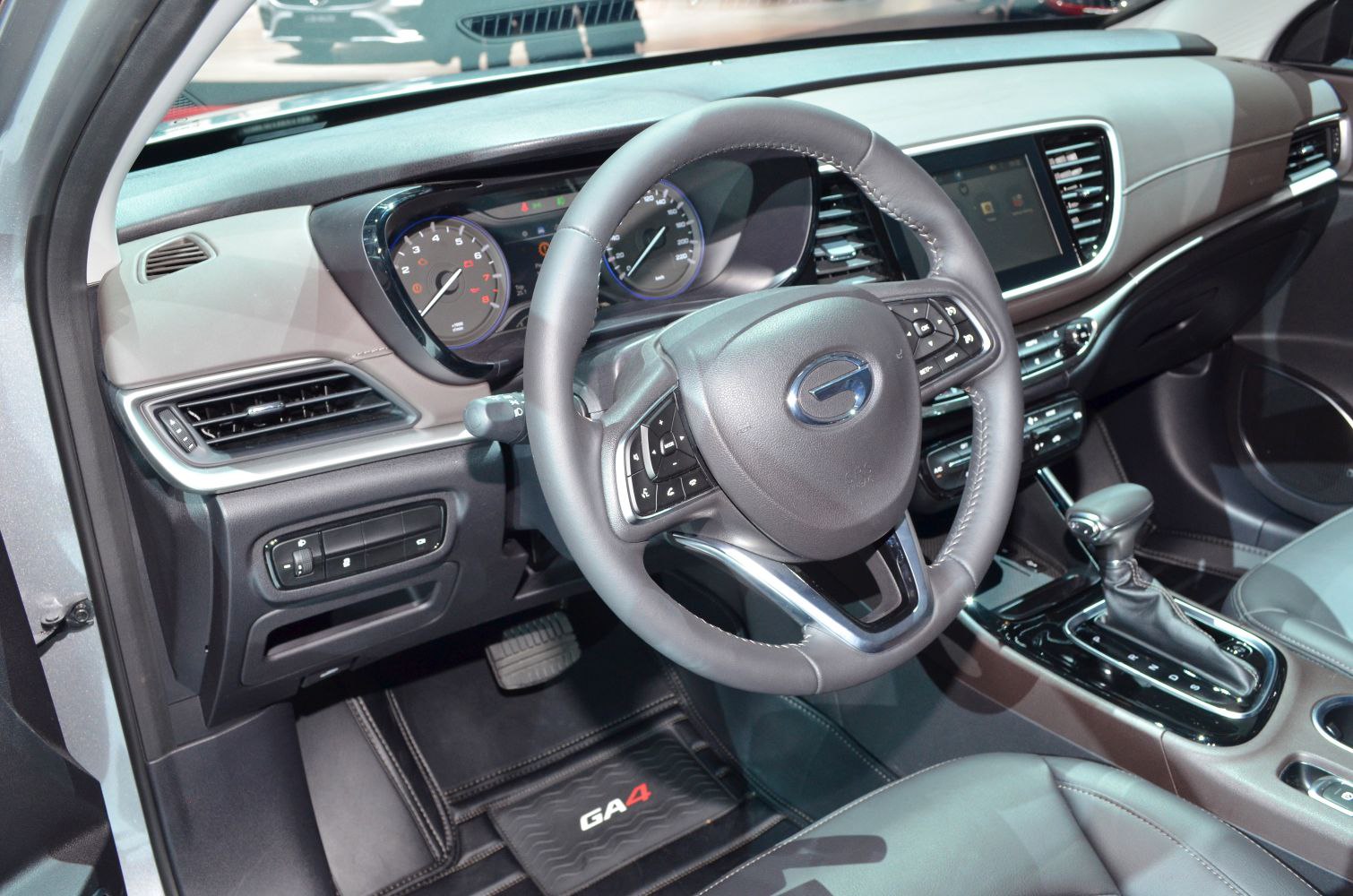 Modern dashboard with digital instrument cluster and multifunction steering wheel