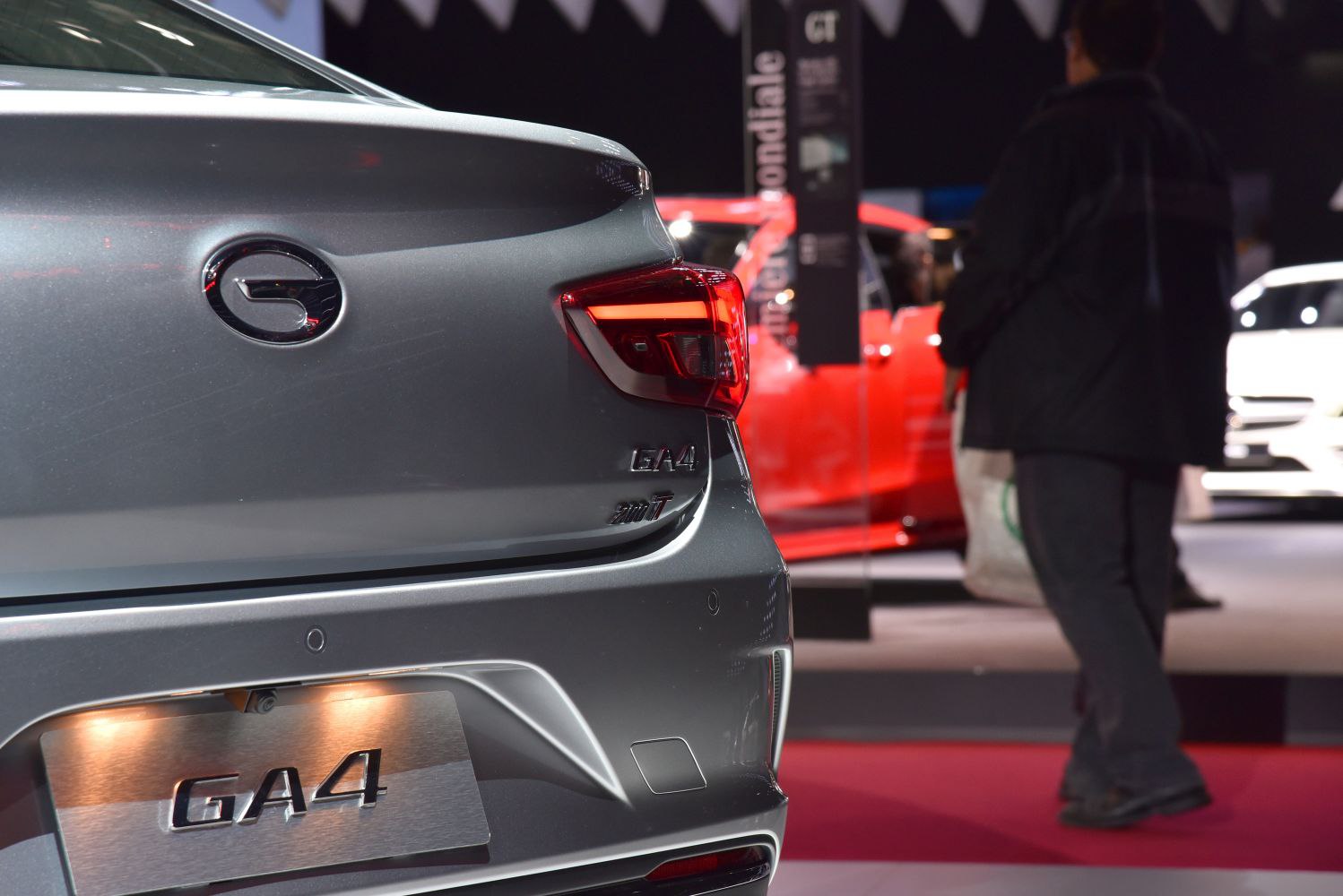 Close-up of rear tail light and model badge on sedan
