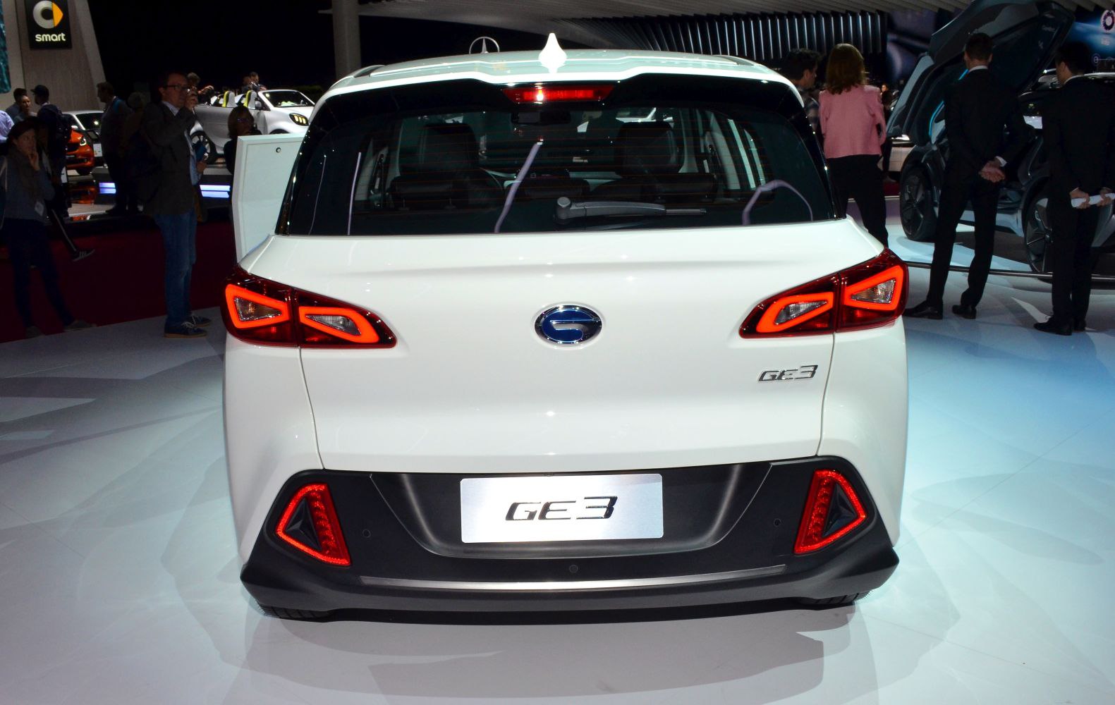 Rear view with distinctive tail lights and rear bumper design