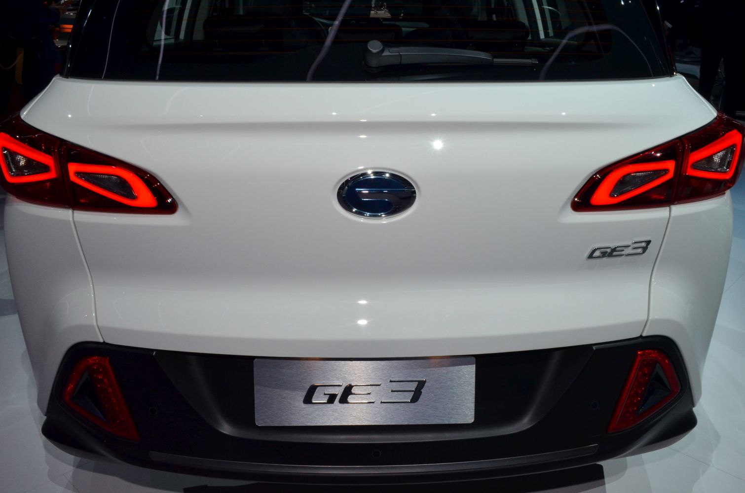 Rear view with distinctive LED tail lights and rear windshield wiper