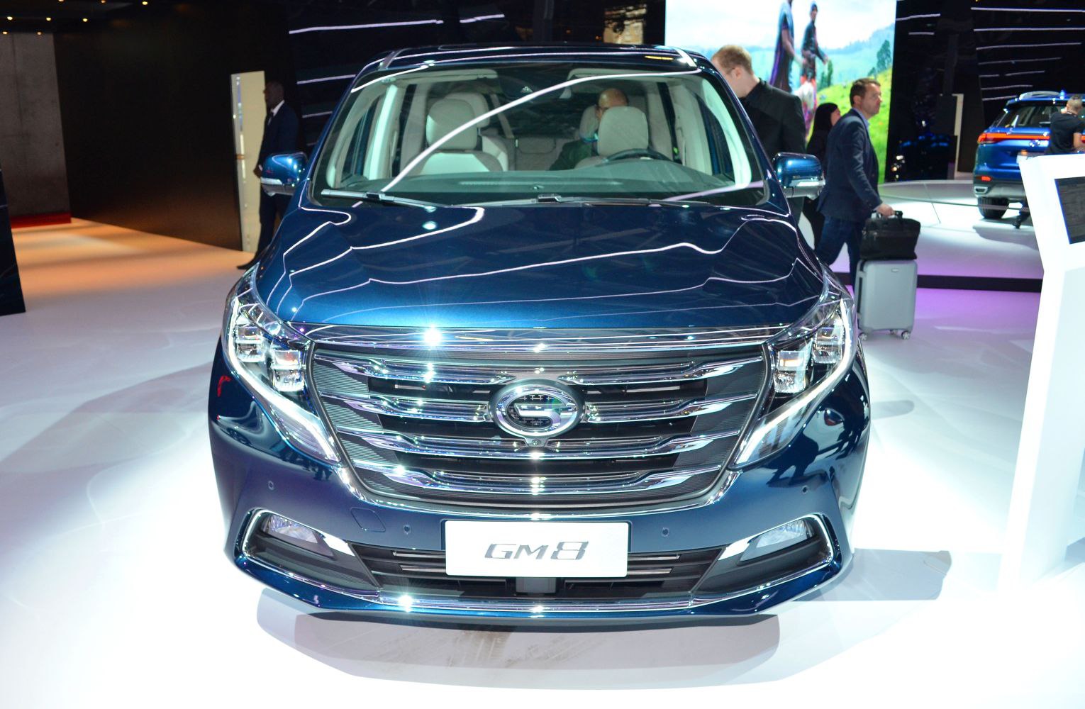 Front view with chrome grille and modern headlights