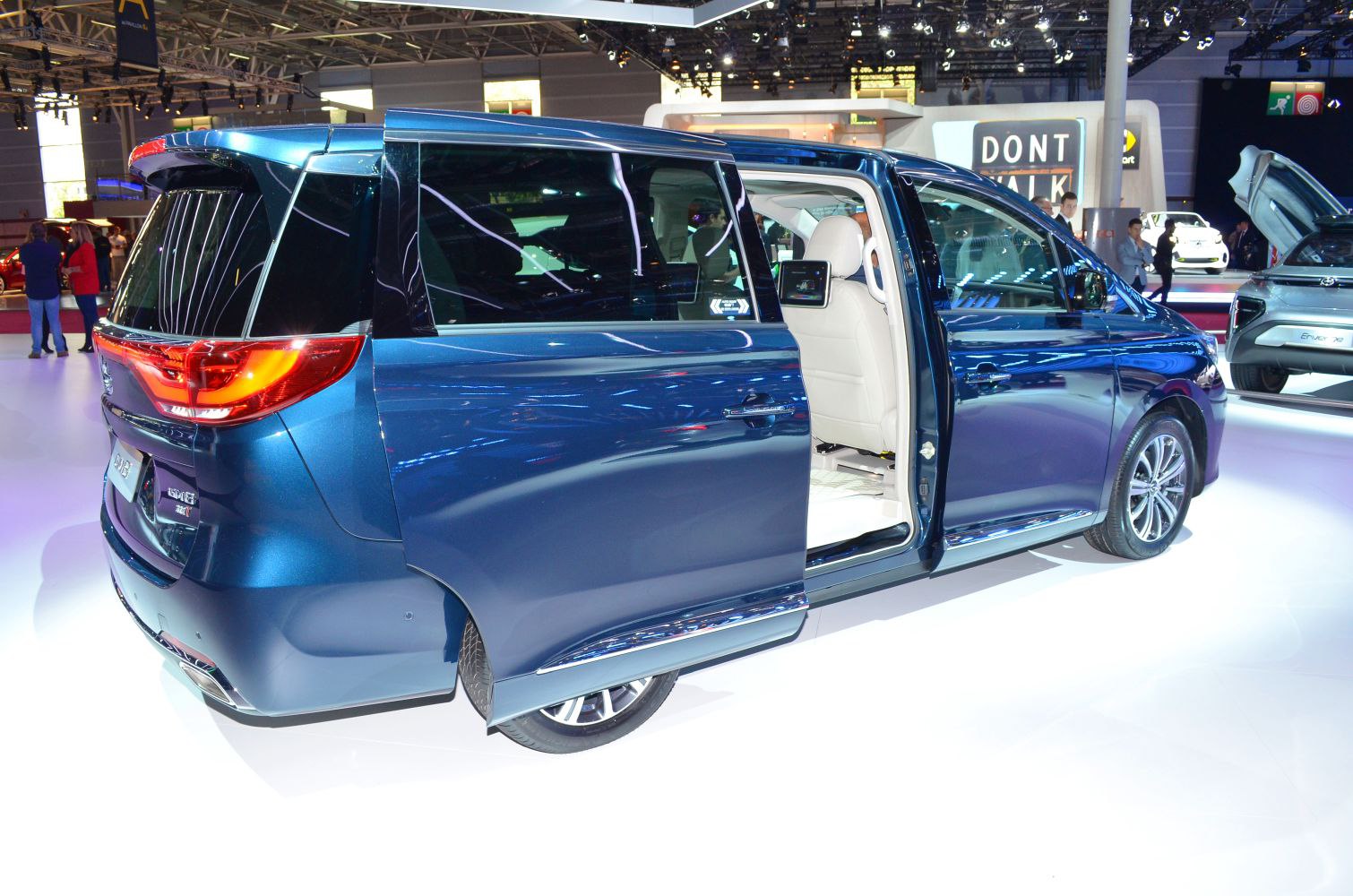 Sliding rear door and LED taillights on a minivan.