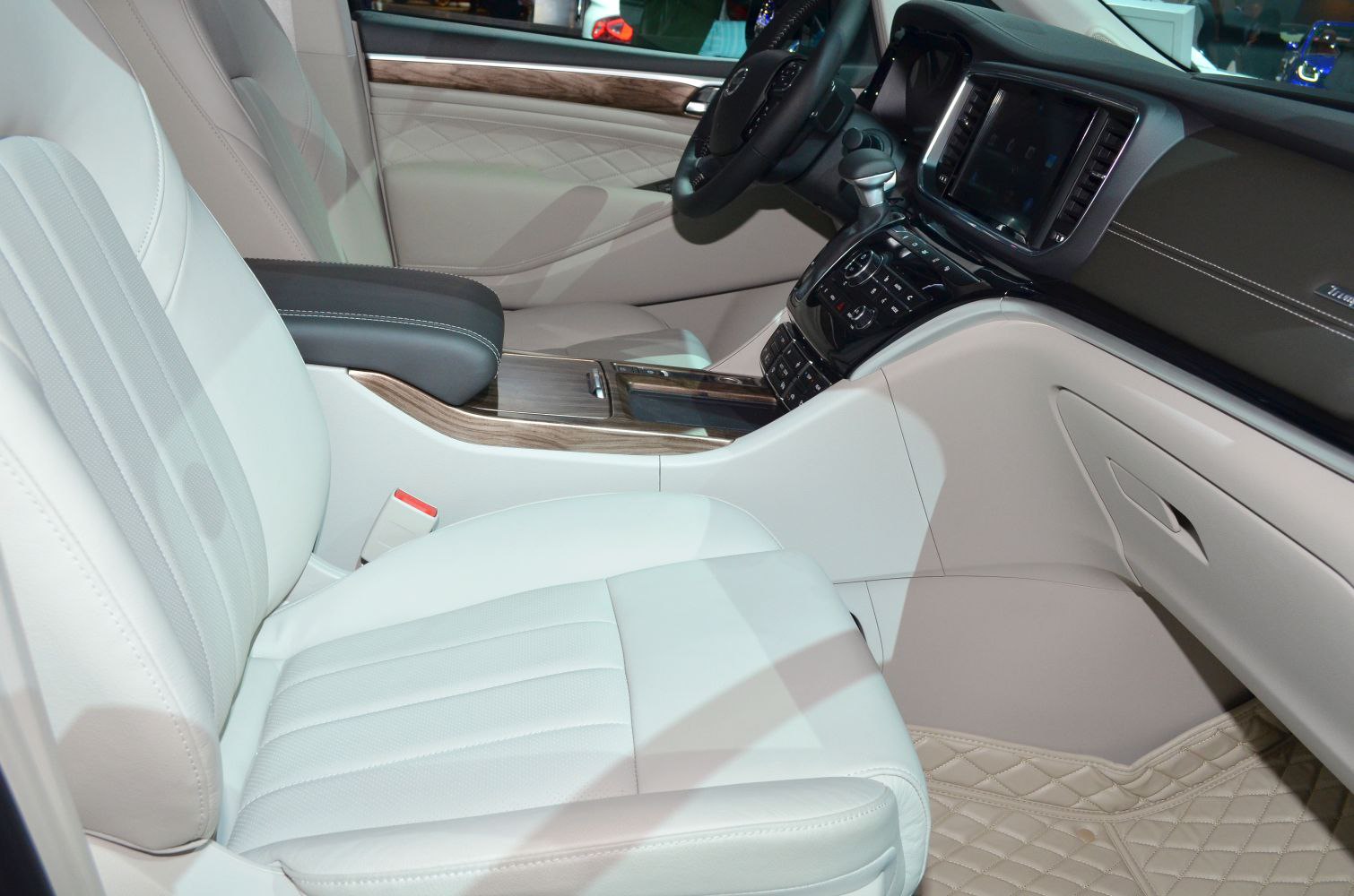 Luxurious leather seats with wood-trimmed dashboard and console