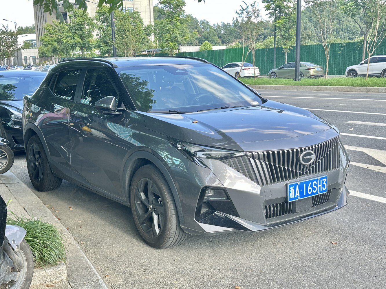 Modern SUV with vertical slat grille and angular LED headlights