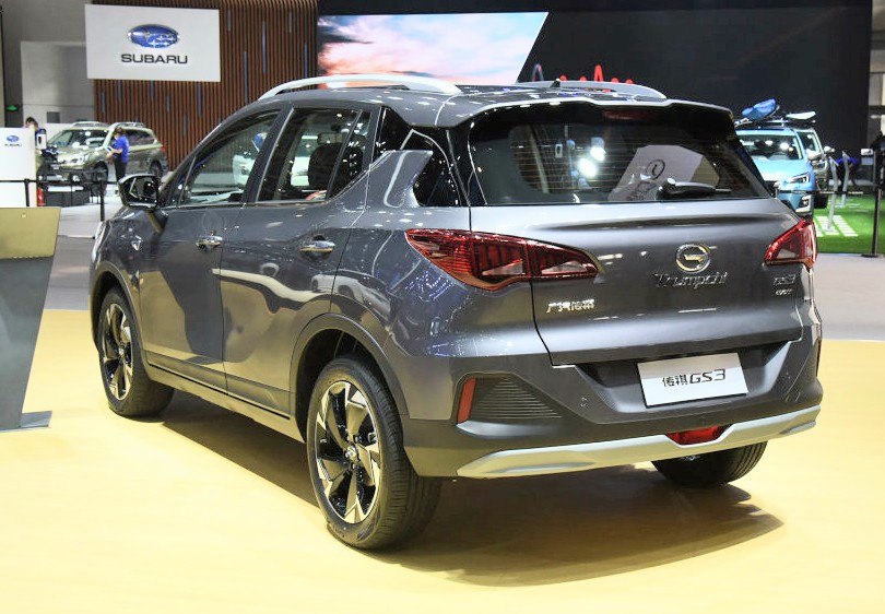 Rear 3/4 view of SUV focusing on tail lights and wheels