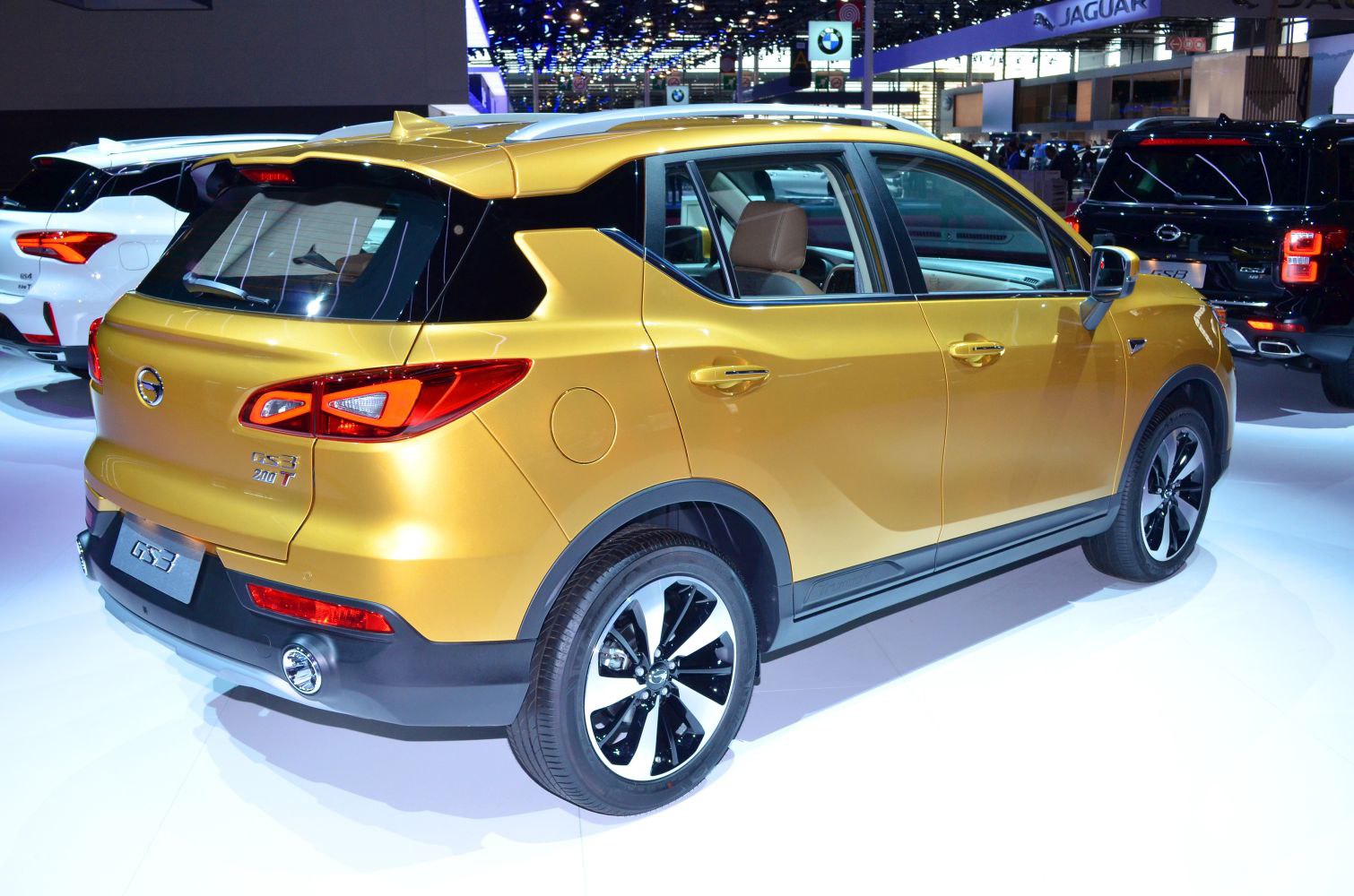 Rear side view of a compact SUV with angular taillights and sporty wheels