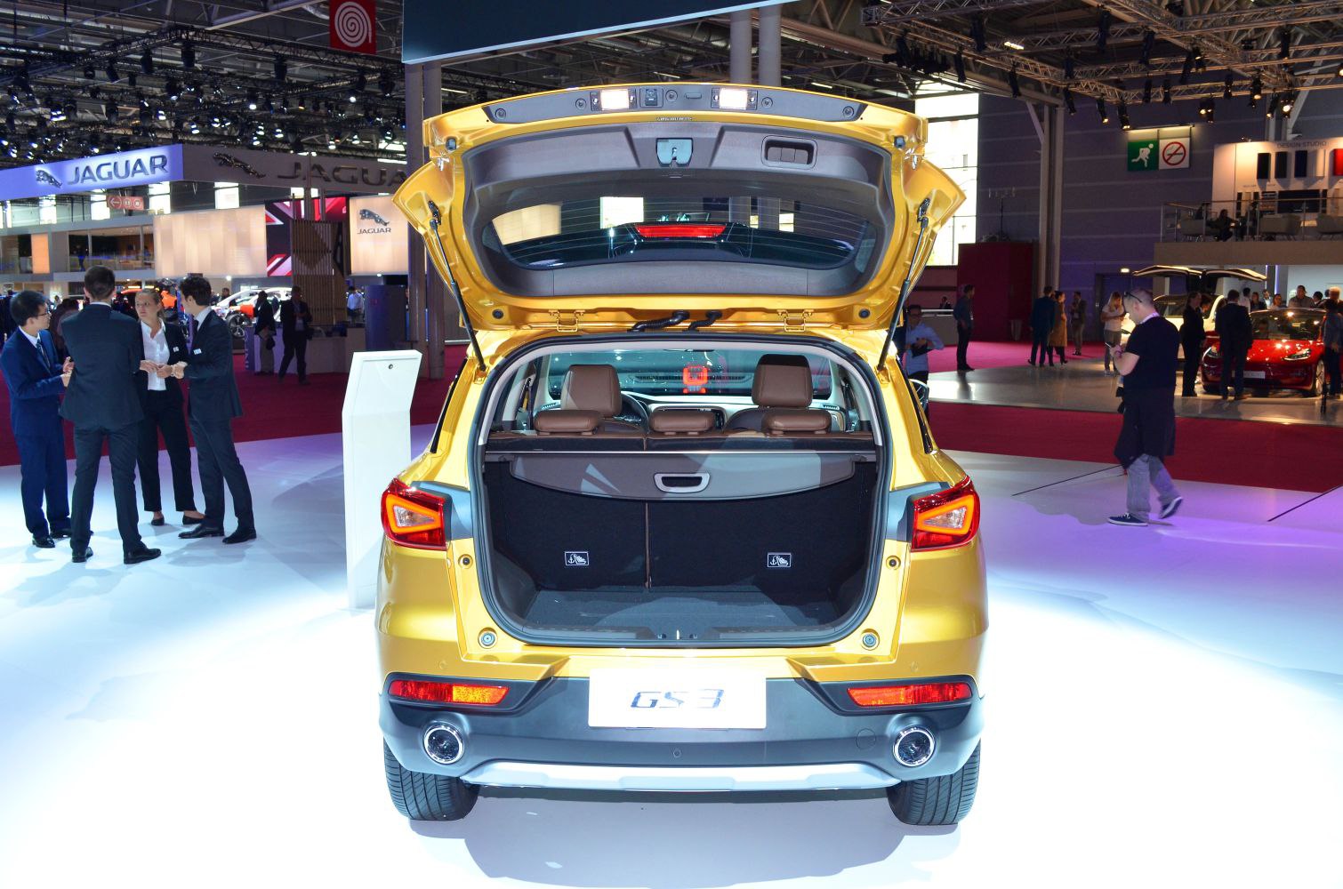 Rear view with open trunk and visible cargo space of a compact SUV