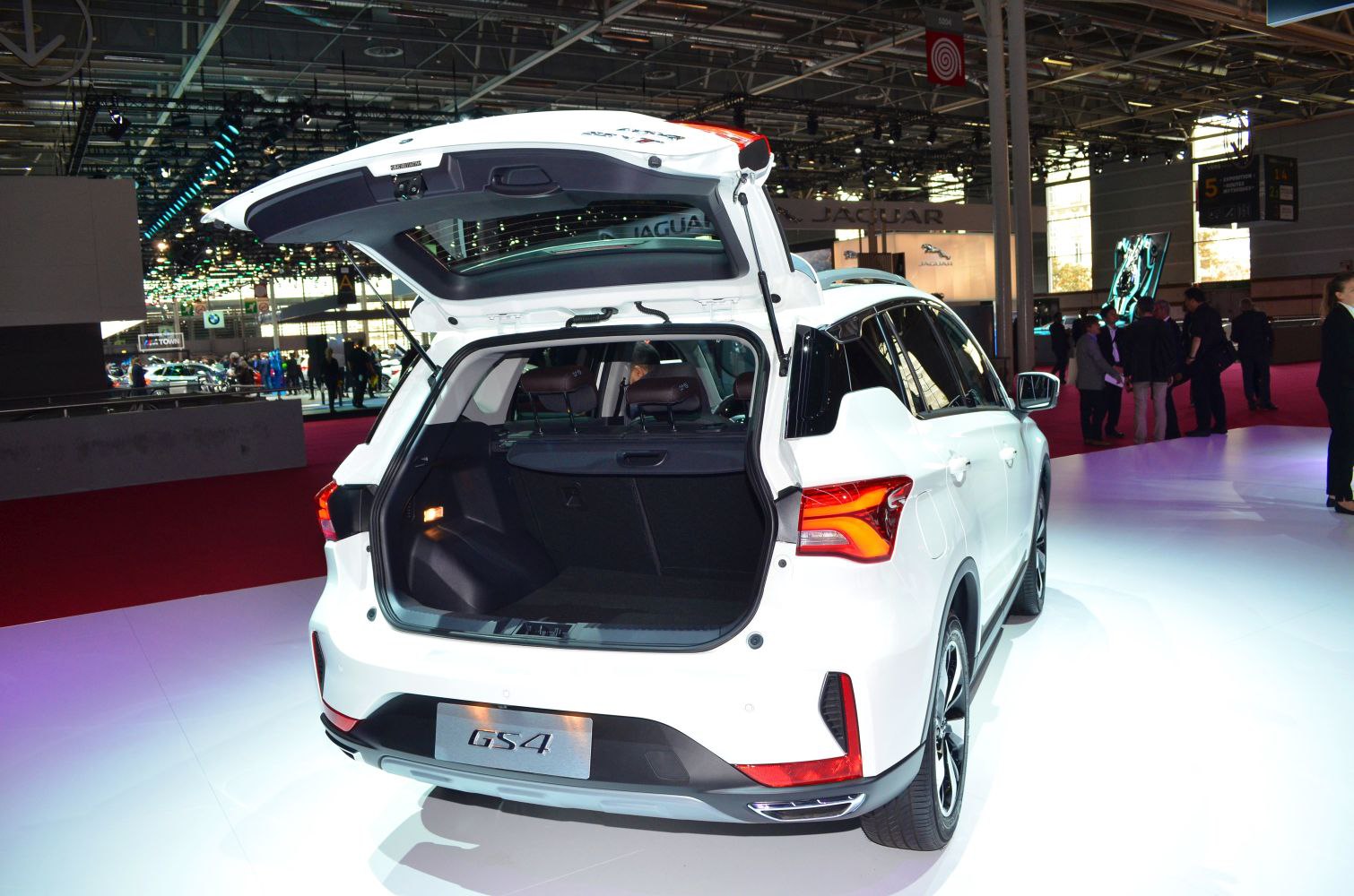 Rear view of SUV with open trunk showing spacious cargo area and modern taillights