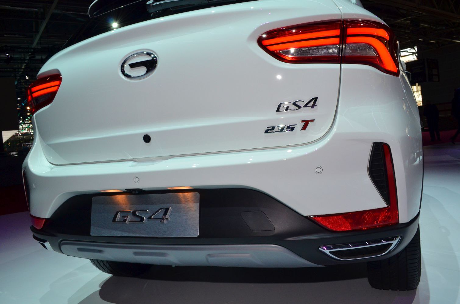 Rear view of taillights and bumper with GS4 model badging.