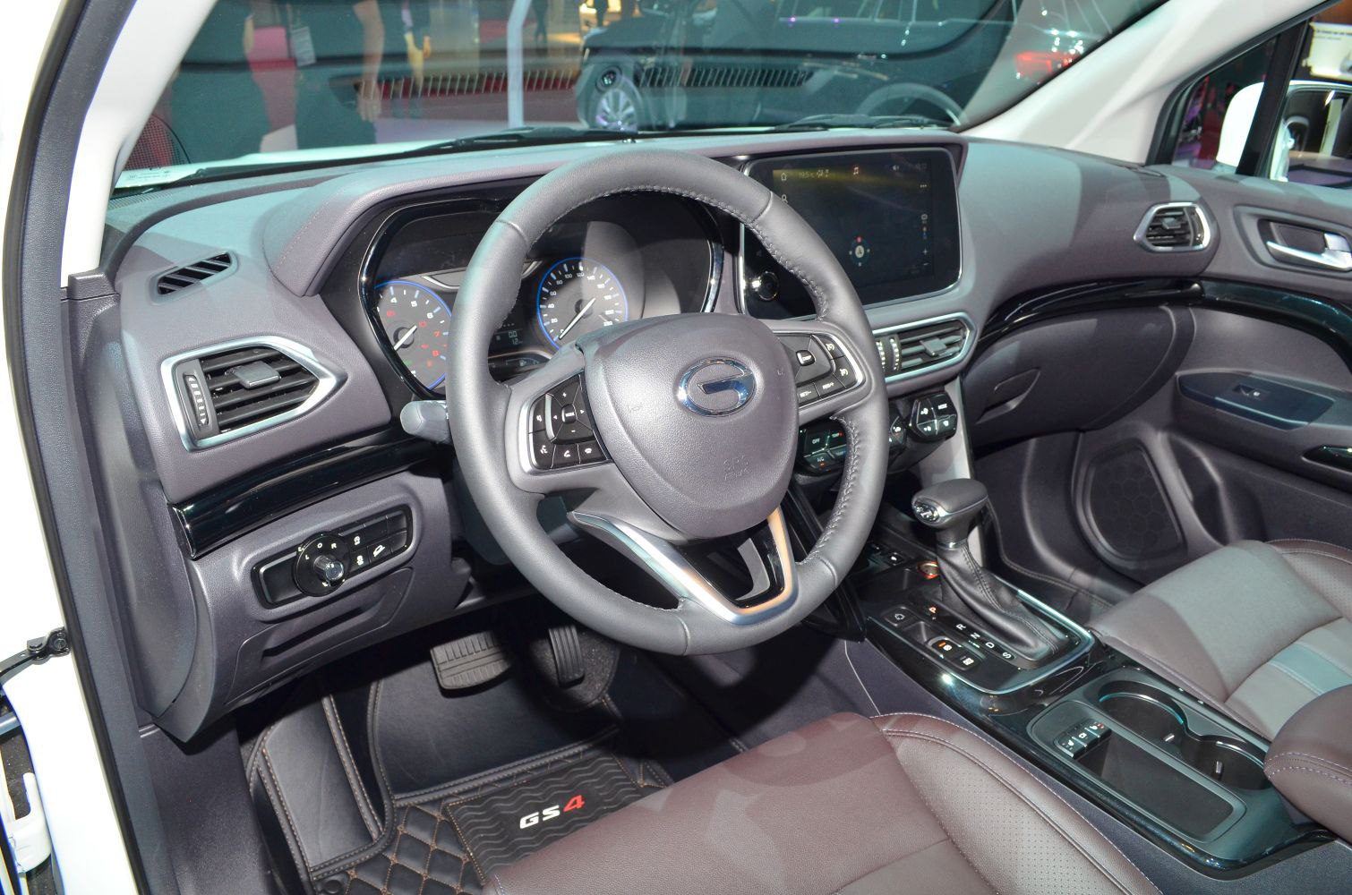 Modern dashboard and multifunction steering wheel with touchscreen console