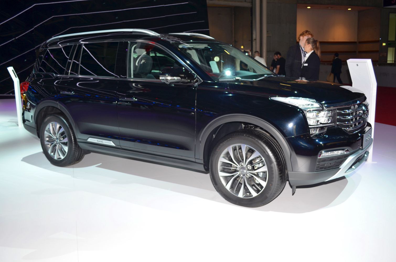 Side profile of mid-size SUV highlighting distinctive front grille and design.