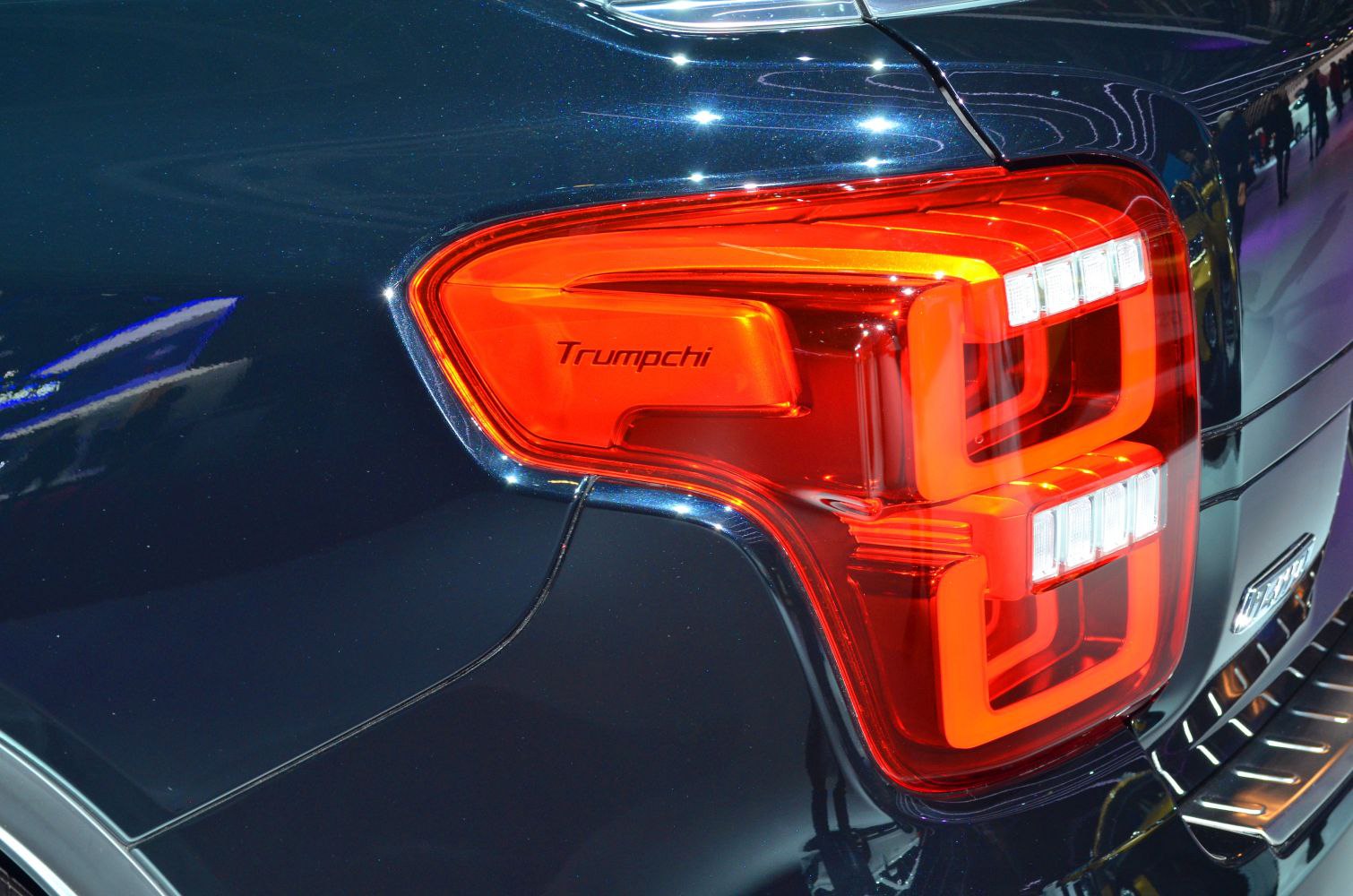 Close-up of rear LED taillight with geometric light patterns