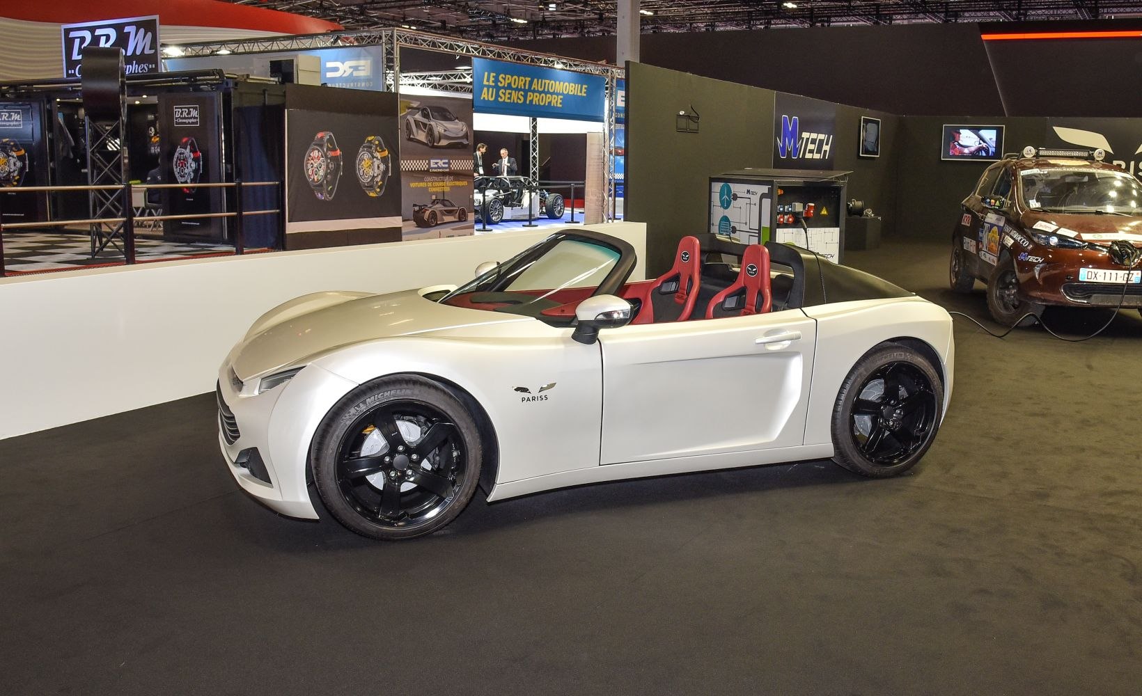 Electric convertible roadster with sleek curves and sporty design