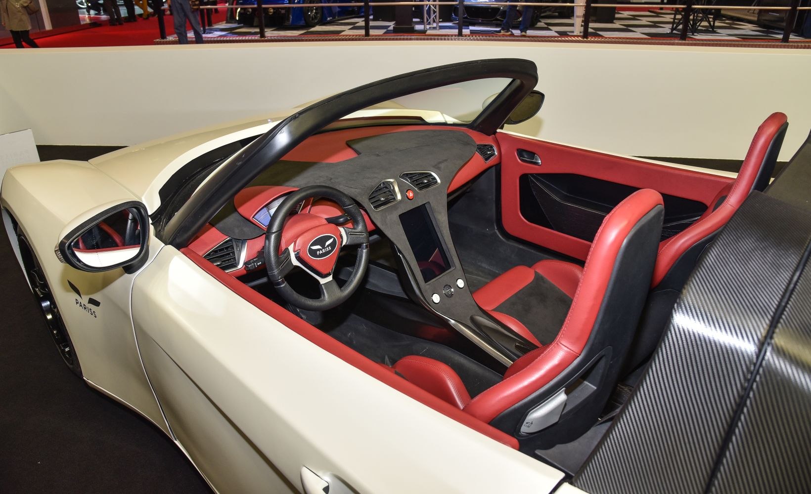 Interior with red leather seats and futuristic dashboard design