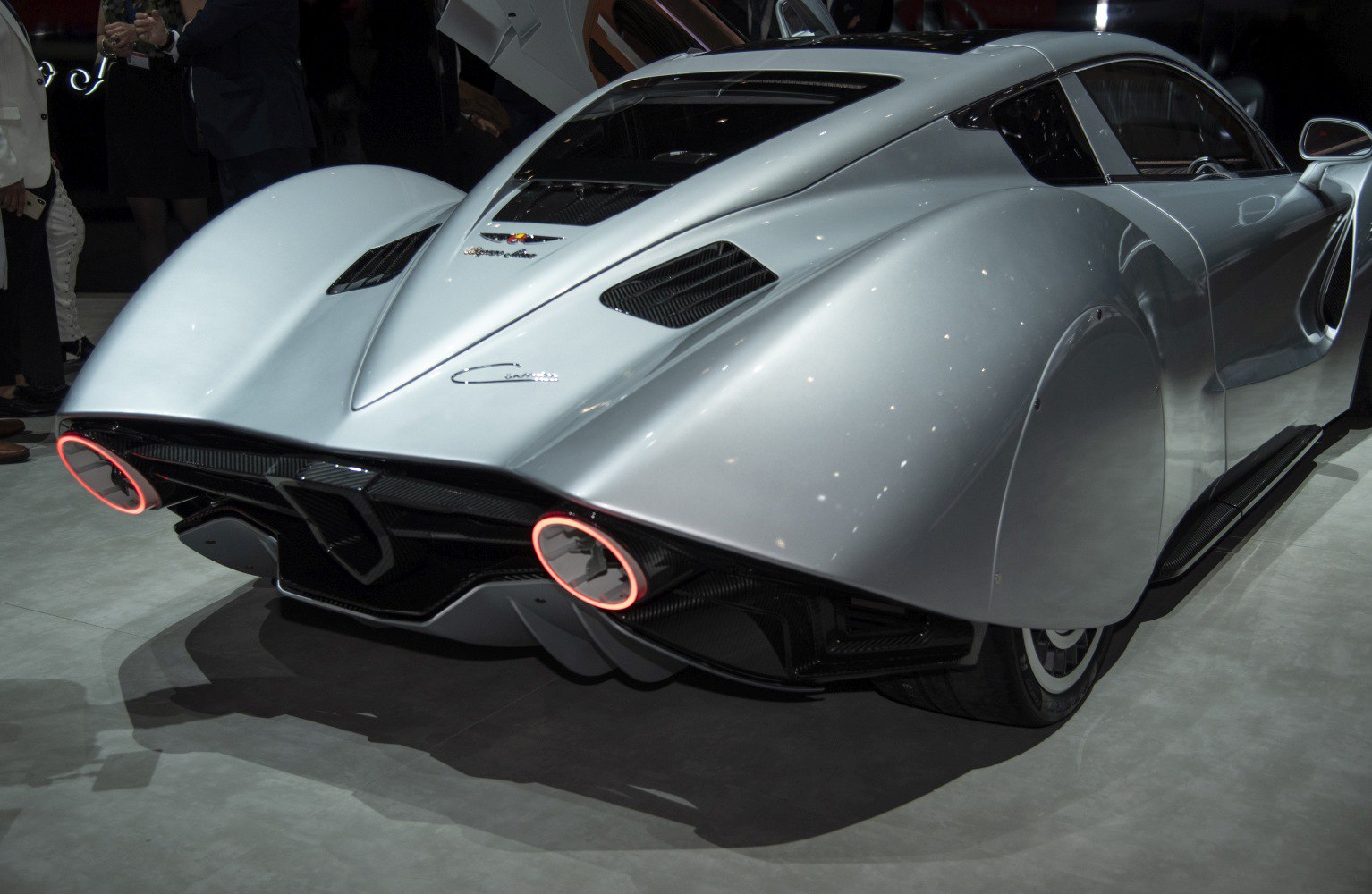 Sleek rear design with illuminated circular exhausts and aerodynamic curves