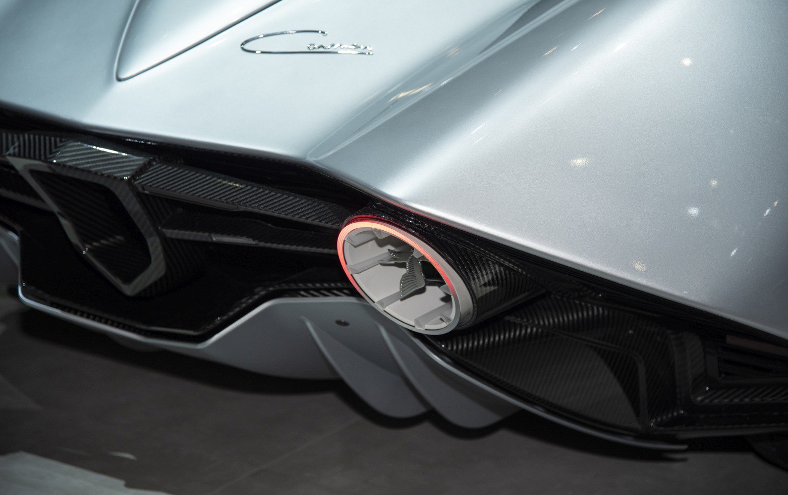 Rear diffuser and emblem with carbon fiber design.