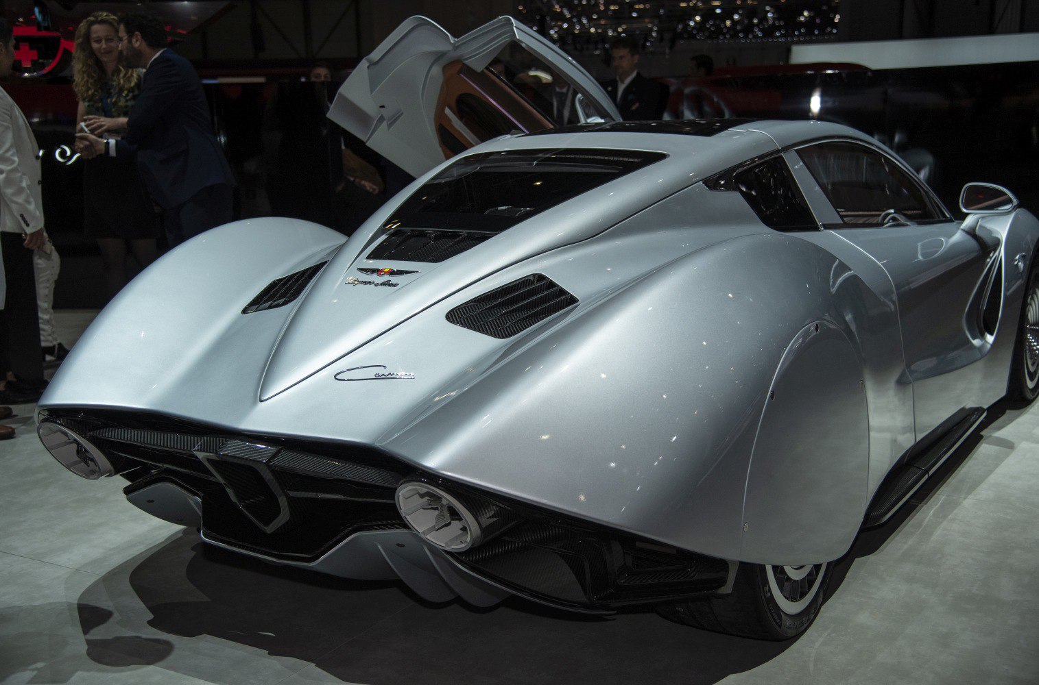 Aerodynamic rear design and winged doors of a luxury sportscar