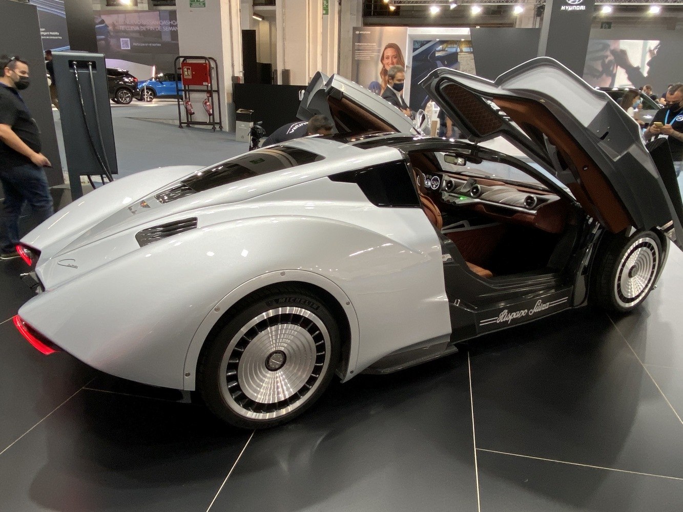 Futuristic gullwing doors and sleek rear aerodynamic design