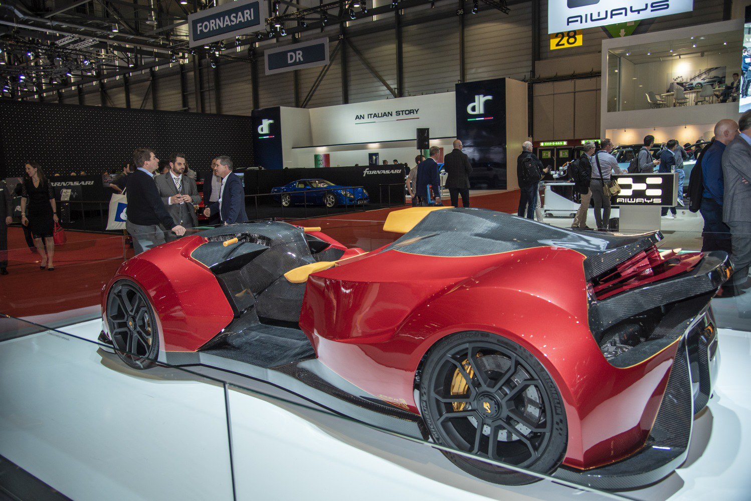 Open-frame quadruple racing vehicle with carbon fiber elements.