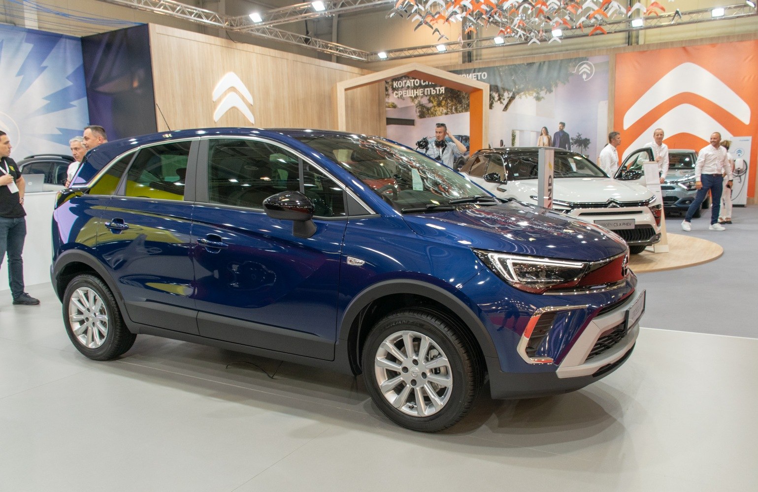 Side view of compact SUV with LED headlights and alloy wheels