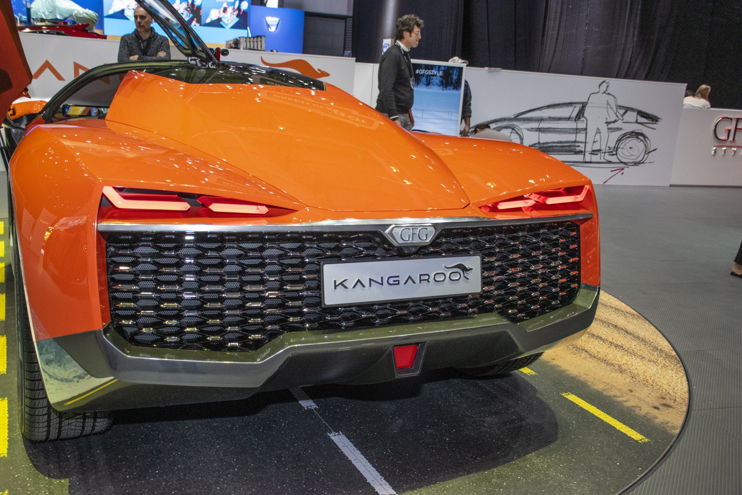 Distinctive rear tail lights and wide rear grille of a concept sports vehicle