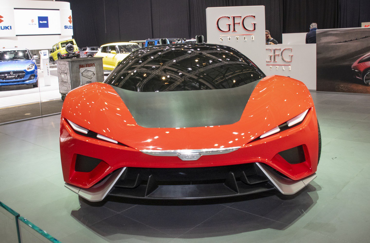 Sleek aerodynamic front with sharp LED headlights and a futuristic design.