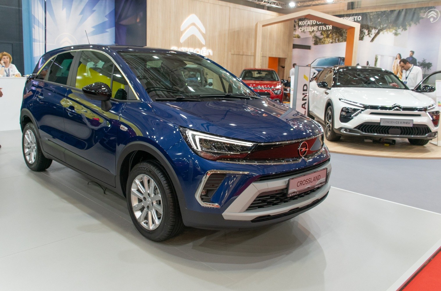 Front side view of SUV with LED headlights and sleek modern design
