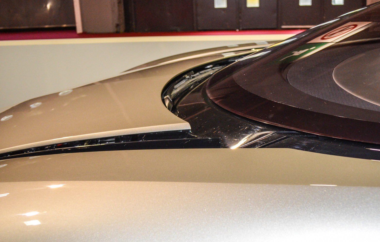 Close-up of rear spoiler and rear window design elements