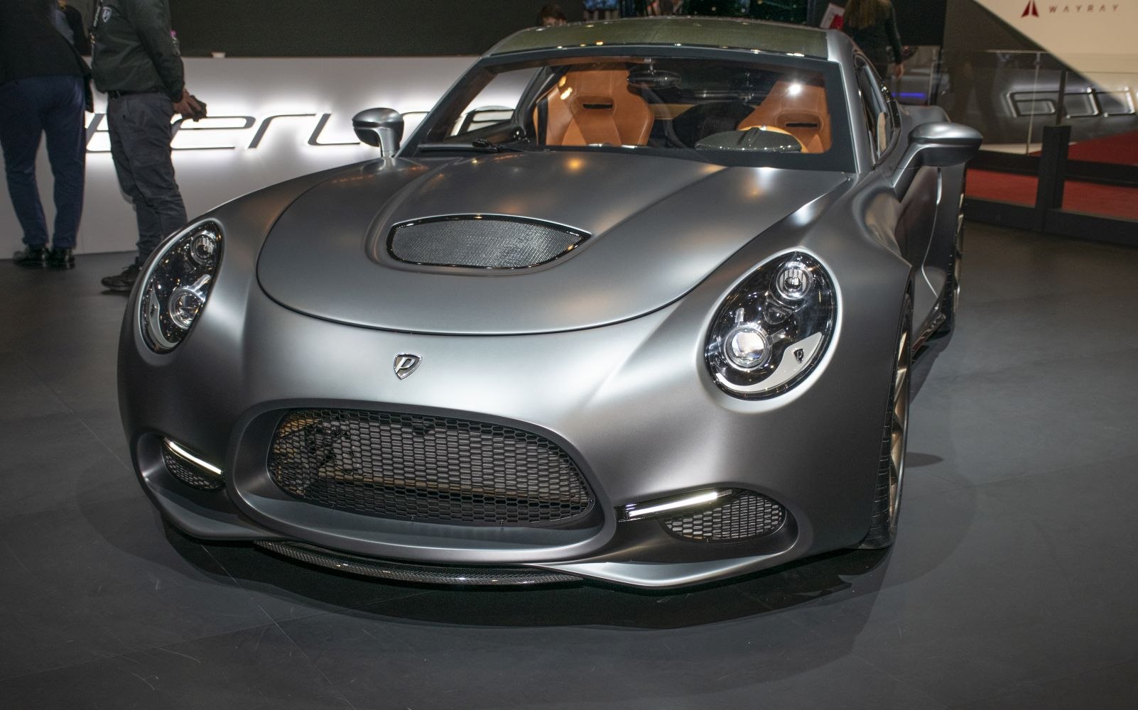 Front view with aerodynamic hood vent and round headlights