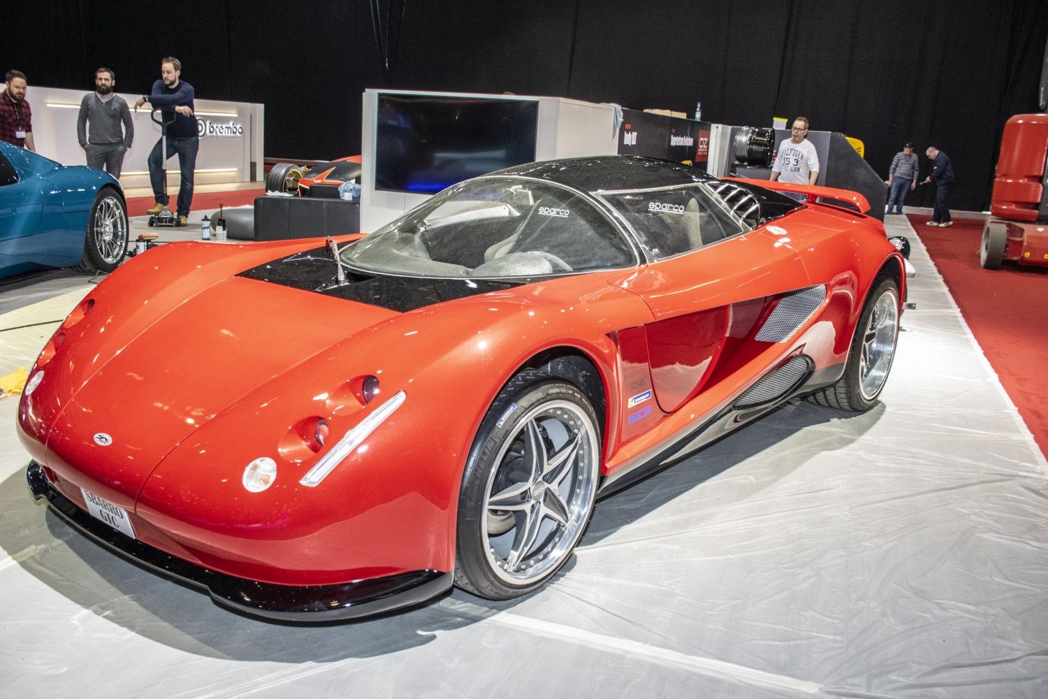 Sleek aerodynamic sports coupe with frameless canopy and performance wheels