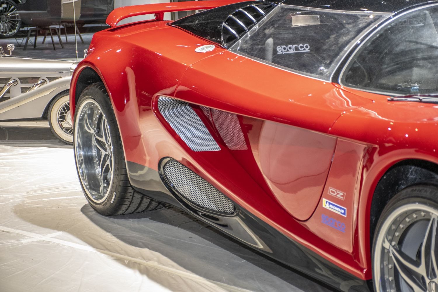 Close-up of rear wheel and side vents with sporty design