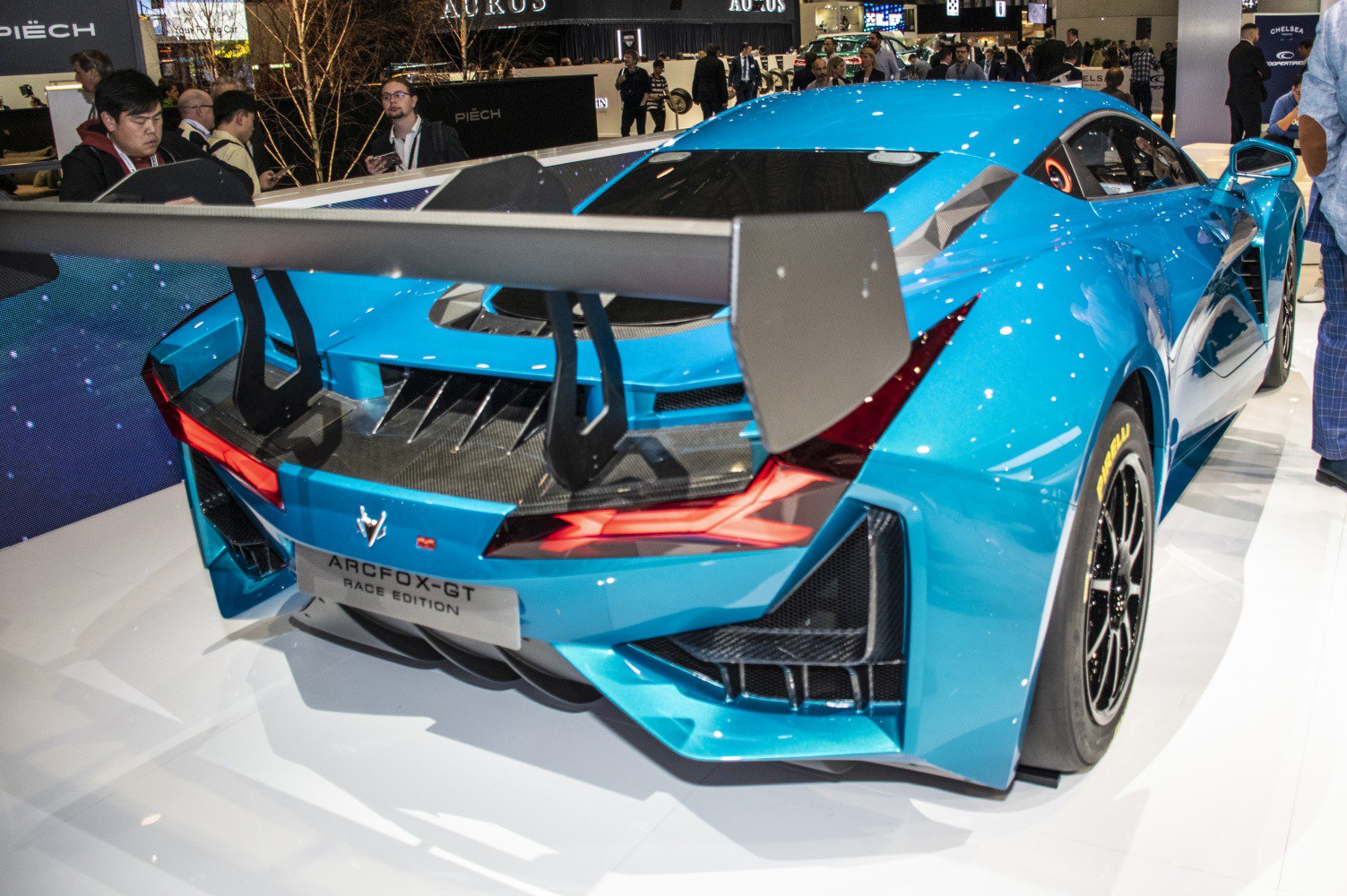 Aggressive rear wing and aerodynamic rear design with racing diffuser and sport tires