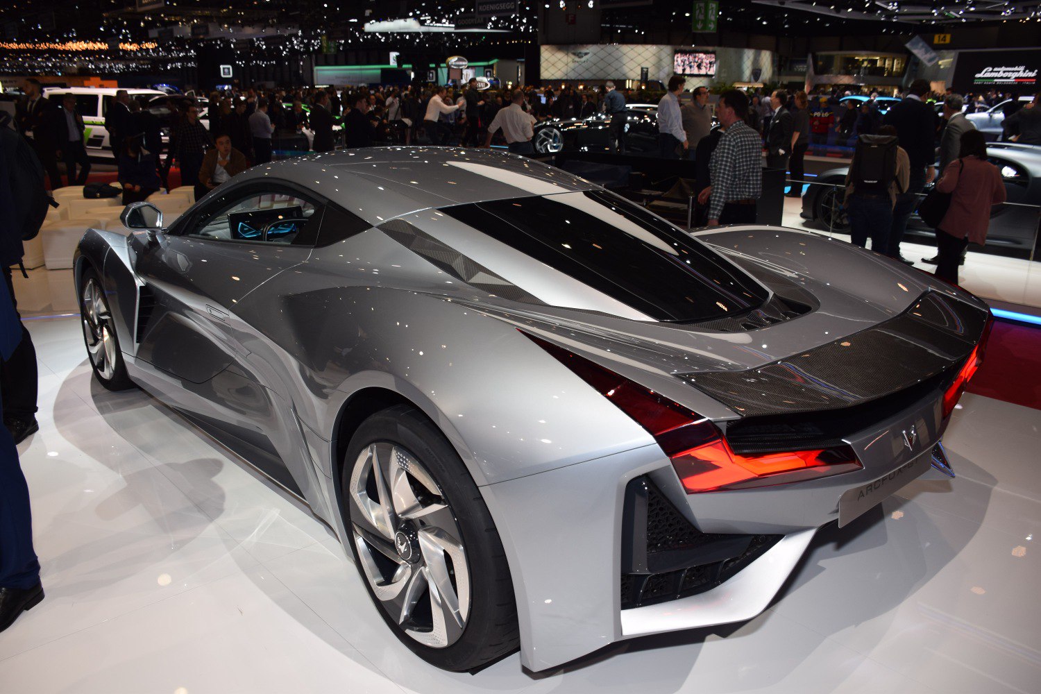 Sleek silver luxury sports coupe rear with LED lights and aerodynamic design