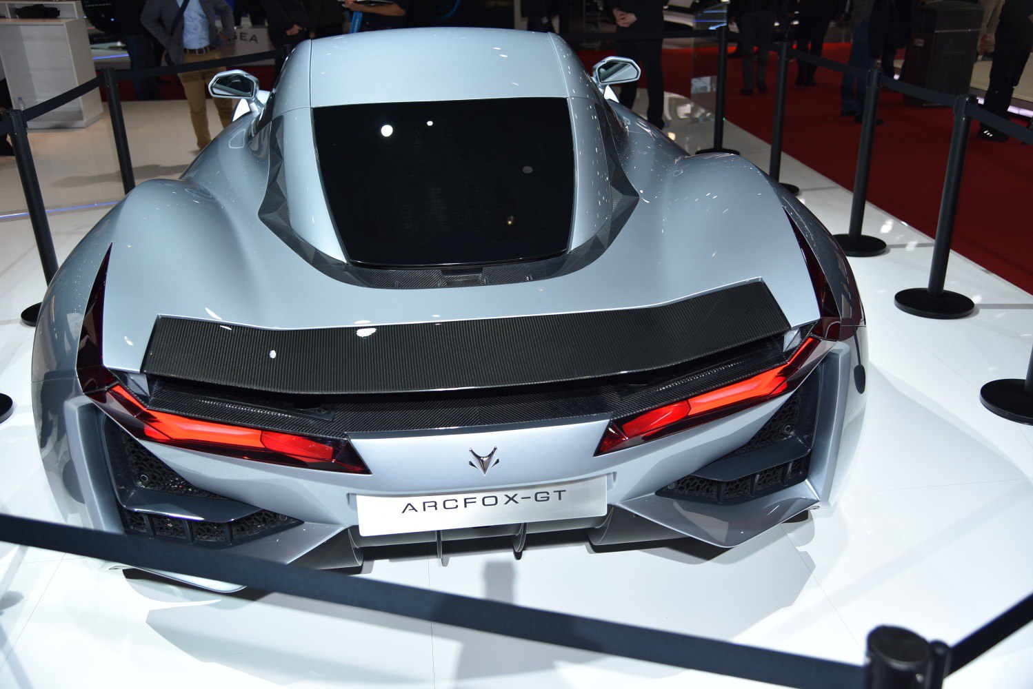 Rear view with carbon fiber spoiler and angular red LED taillights