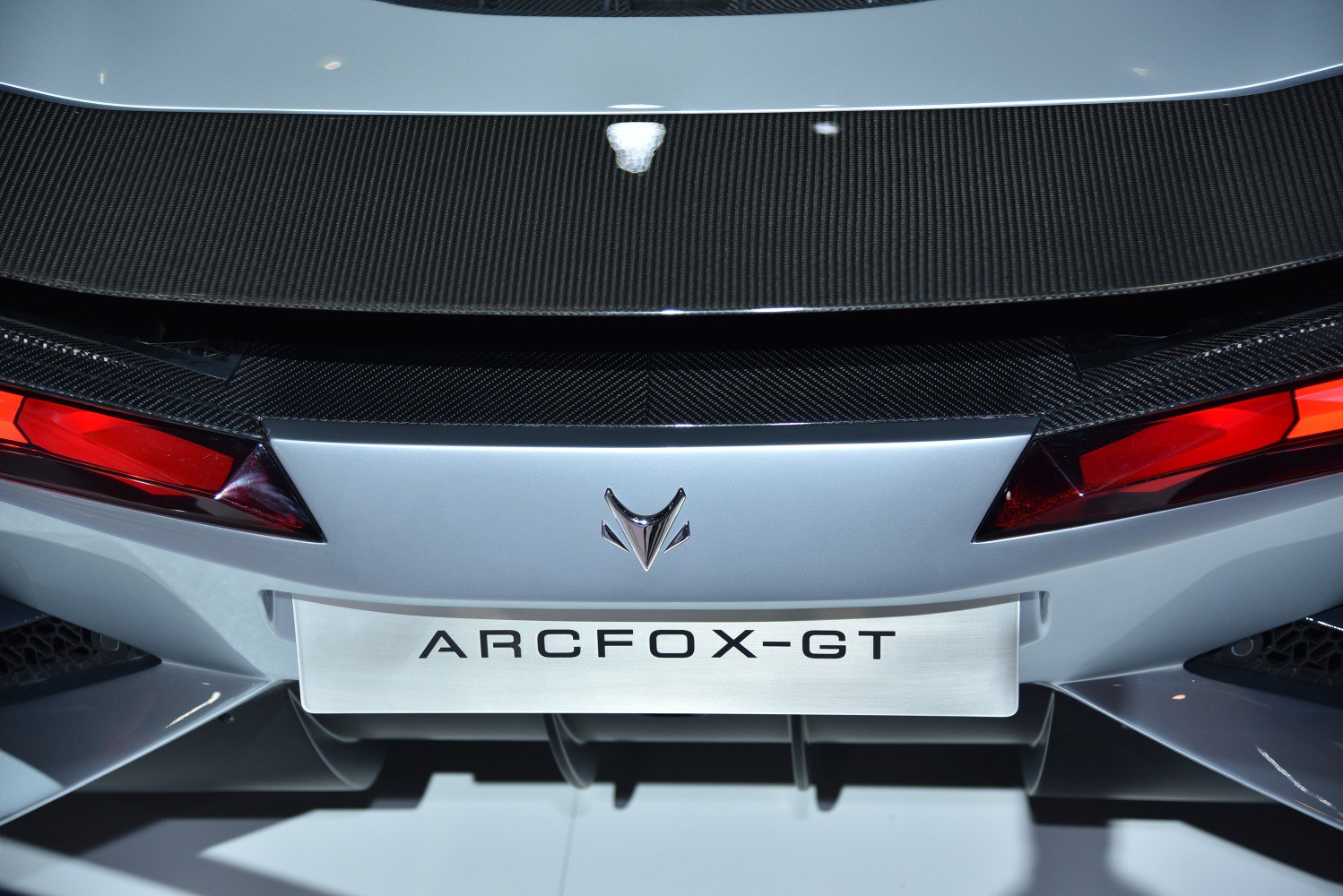 Rear view with carbon fiber panel and red LED taillights