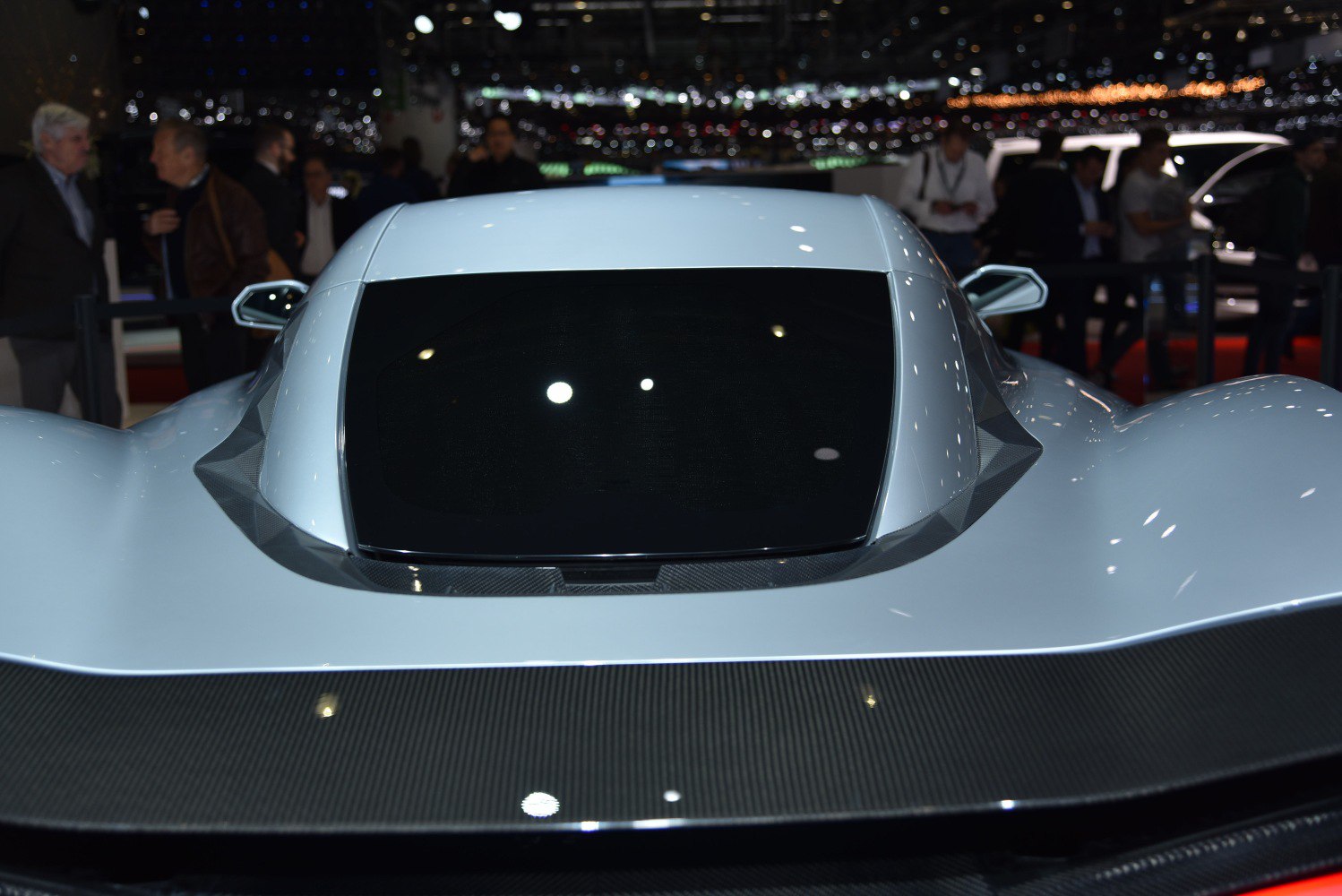 Rear window with carbon fiber spoiler and aerodynamic rear design