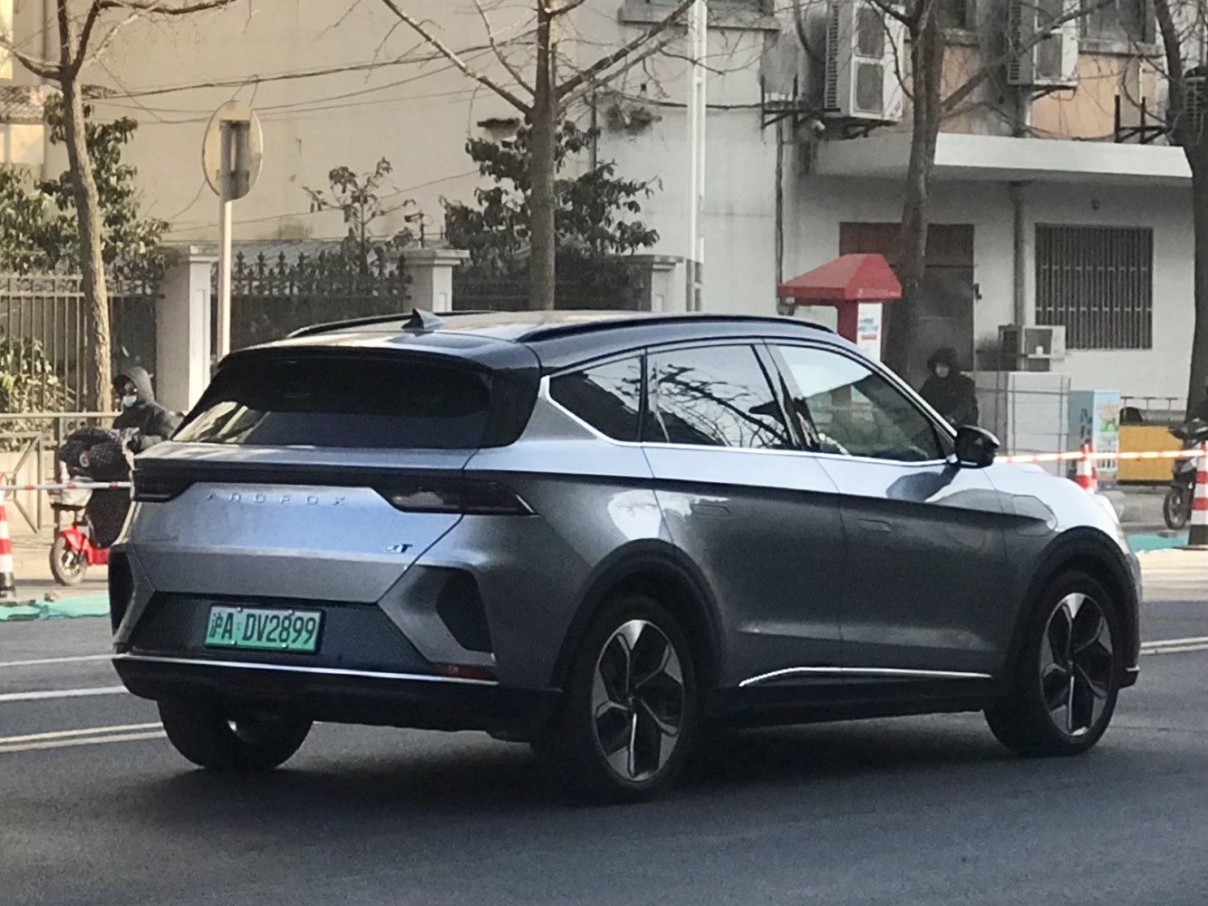 Rear view of electric SUV with sleek, aerodynamic styling