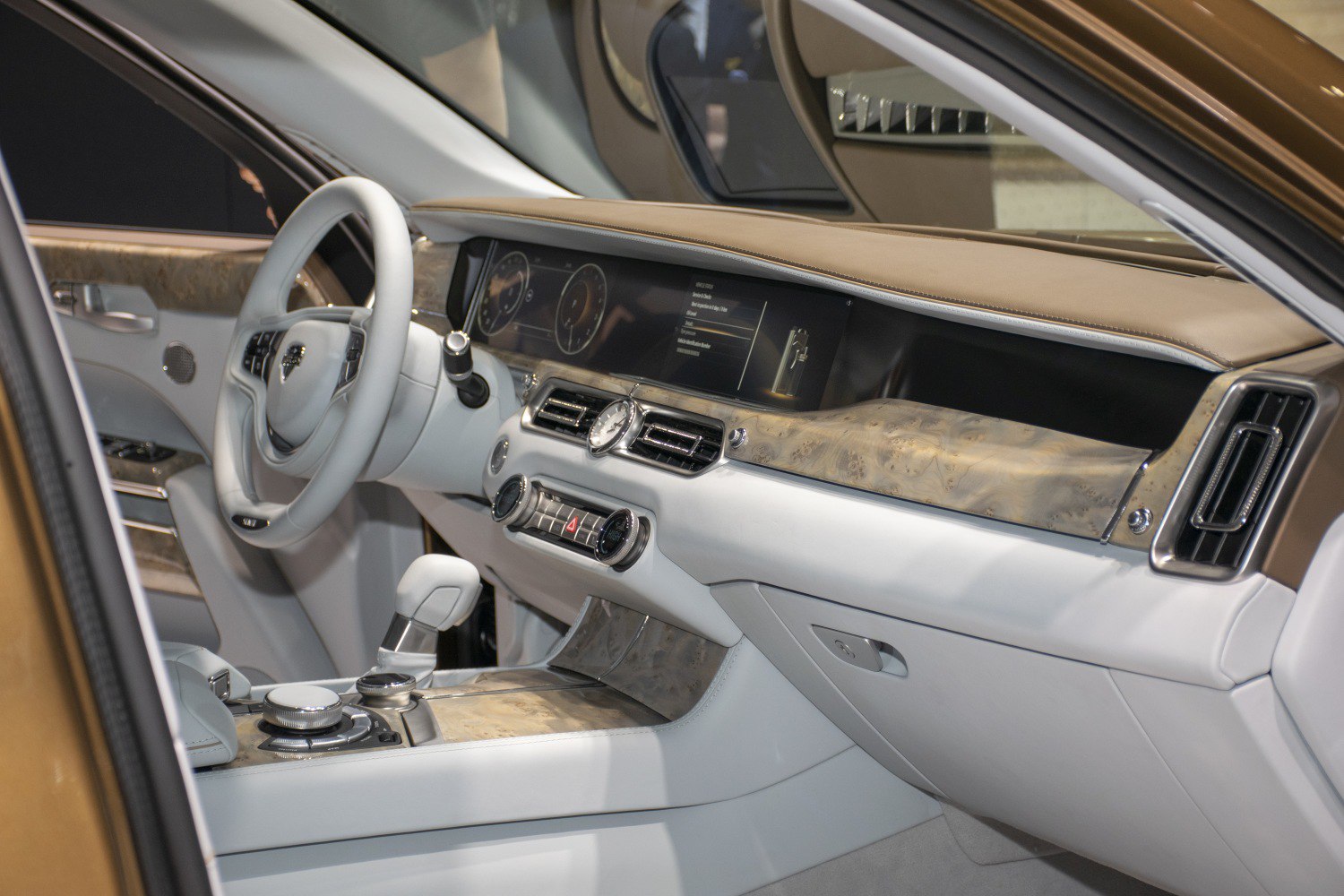 Luxury wooden dashboard with digital instrument cluster and elegant steering wheel
