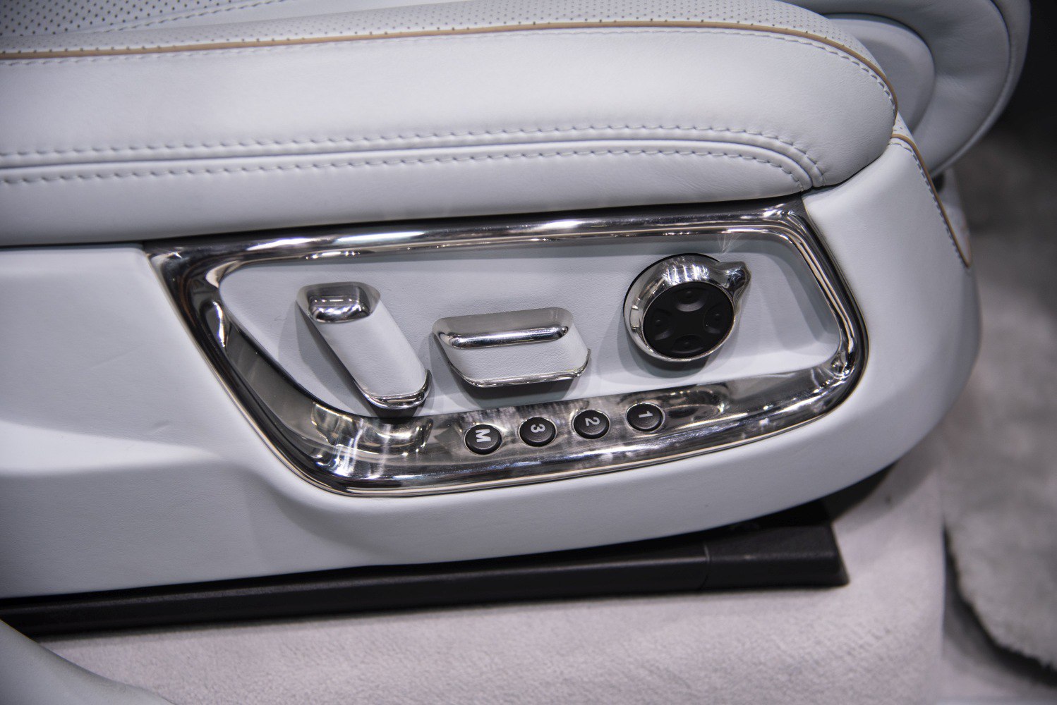 Chrome seat adjustment controls with memory buttons