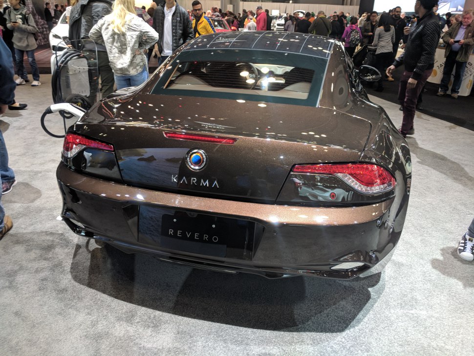 Luxury hybrid rear with charging port and sleek taillights