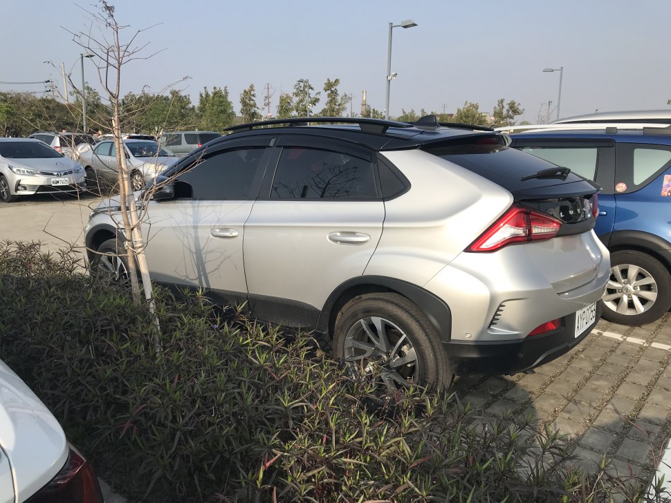 Silver compact crossover with angular rear taillights and tinted windows