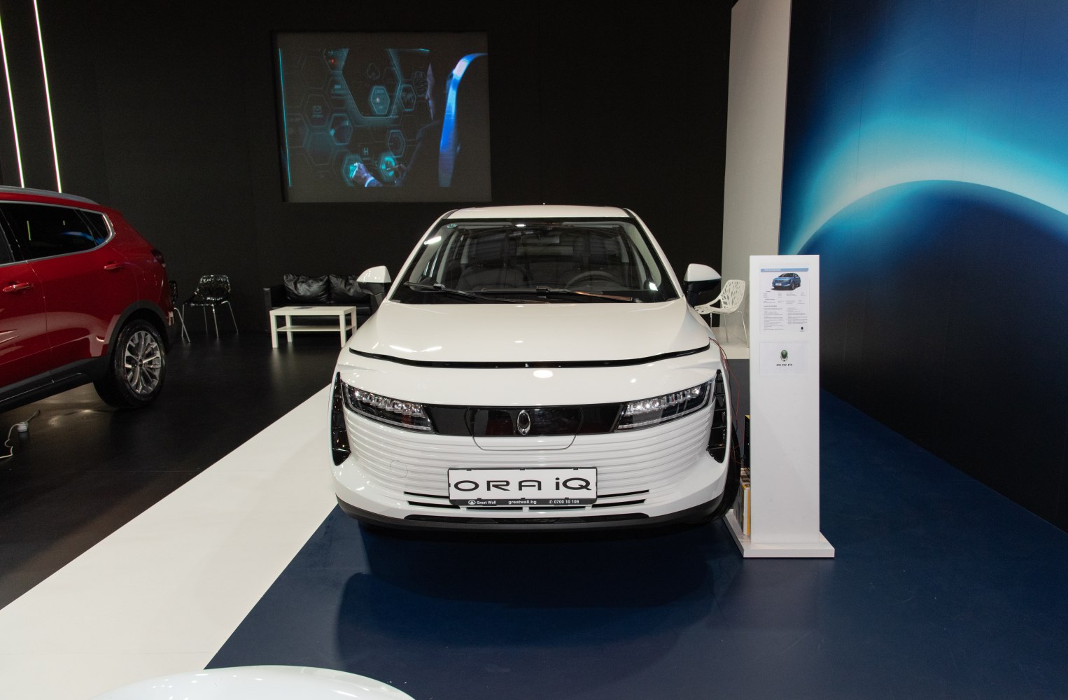 Front view showing sleek grille and advanced LED headlights