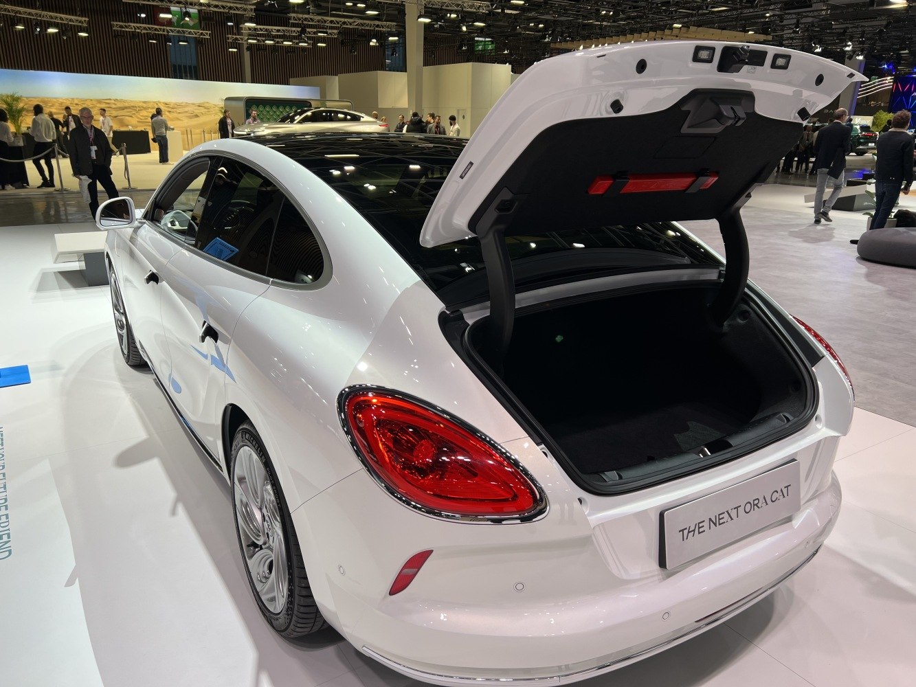 Electric hatchback with open rear trunk and sleek rear design