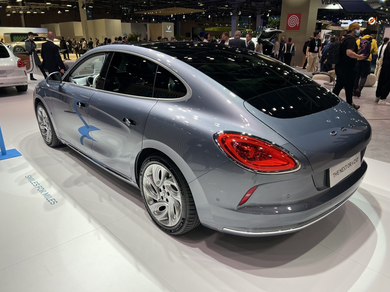 Rear and side profile with aerodynamic curves and distinctive taillights