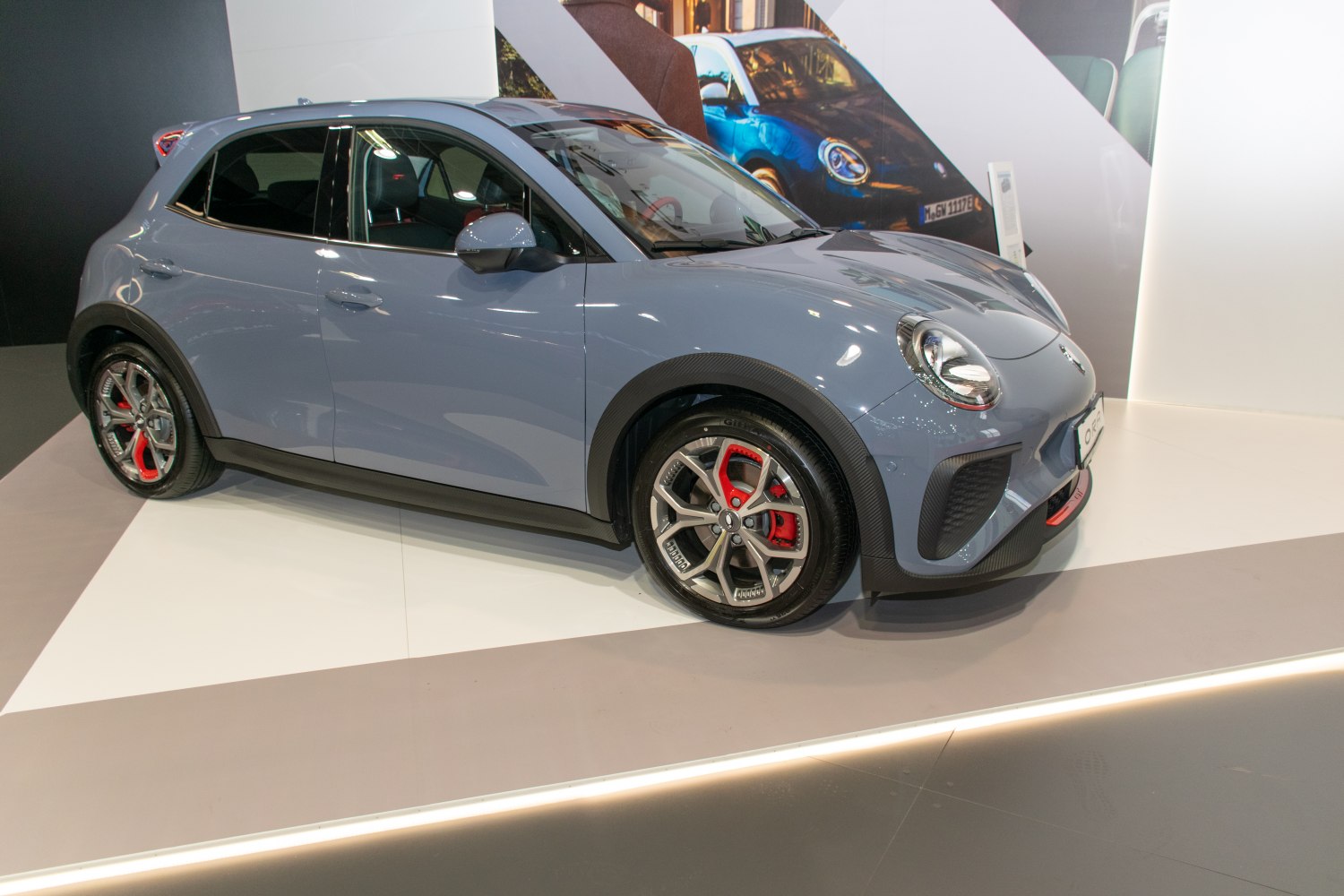 Compact hatchback with alloy wheels and red brake calipers